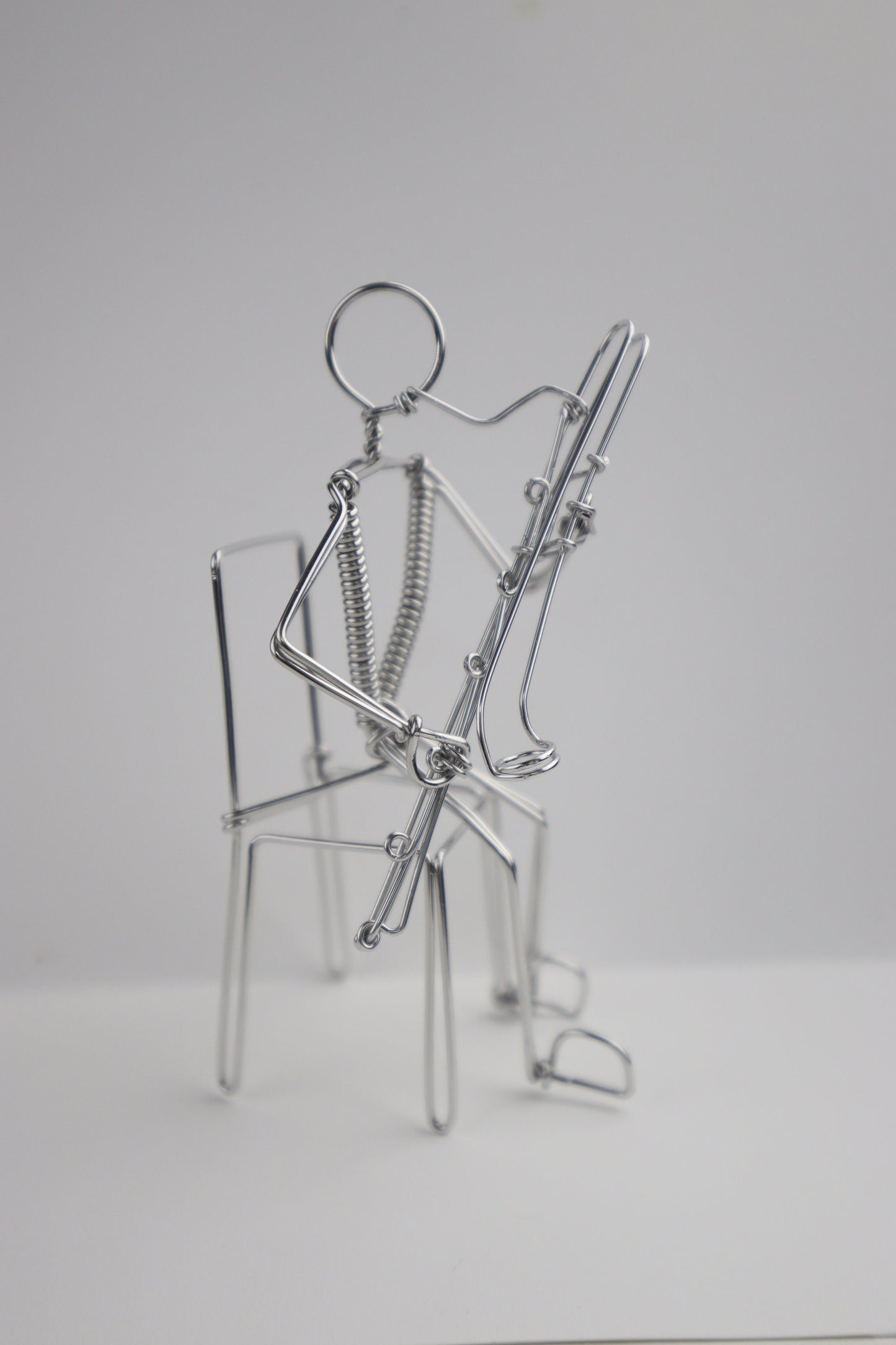 Sitting Musician Ornament Contra Bassoon Player and Many More Wire Art Sculptures