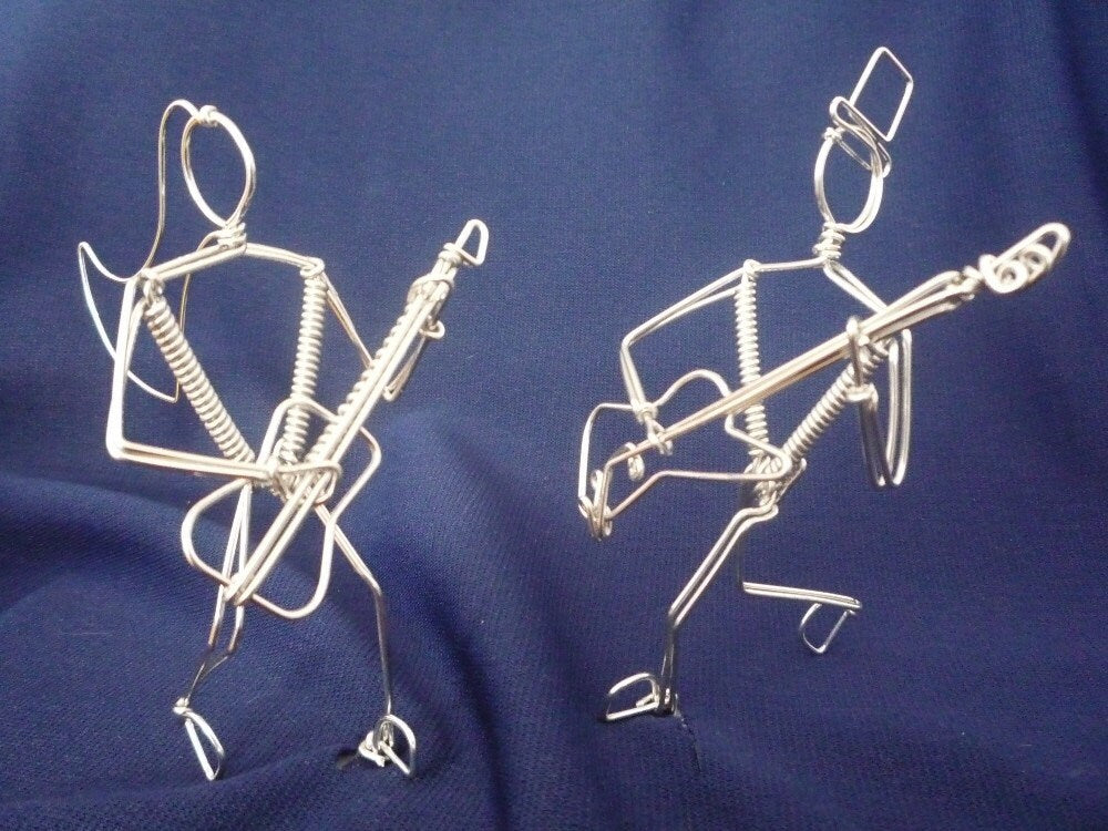 Sitting Musician Ornament Contra Bassoon Player and Many More Wire Art Sculptures